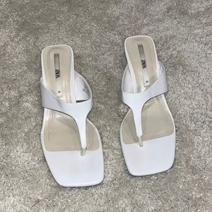 White heeled sandals